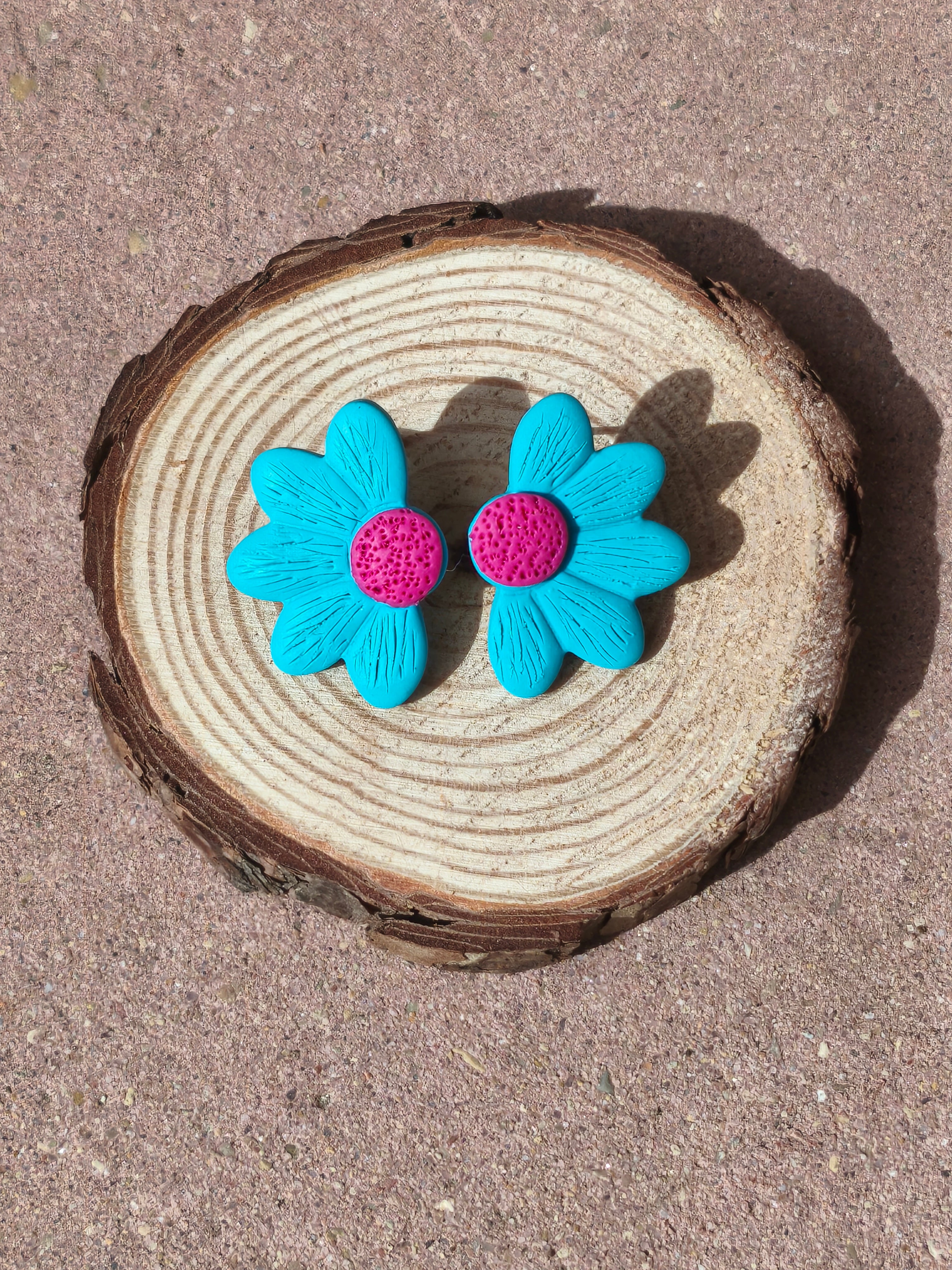 Bellis azul y fucsia