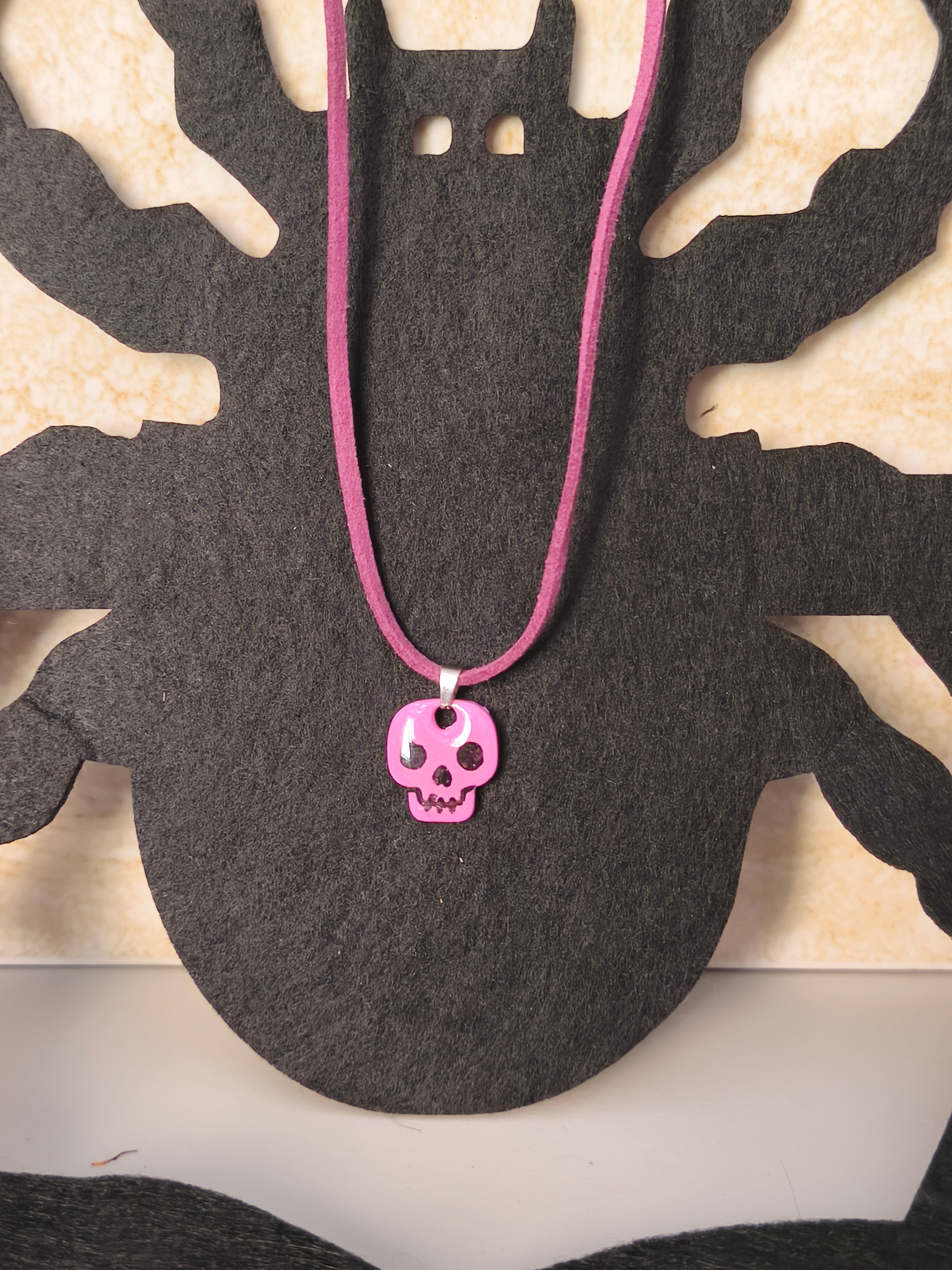 Colgante calavera fucsia